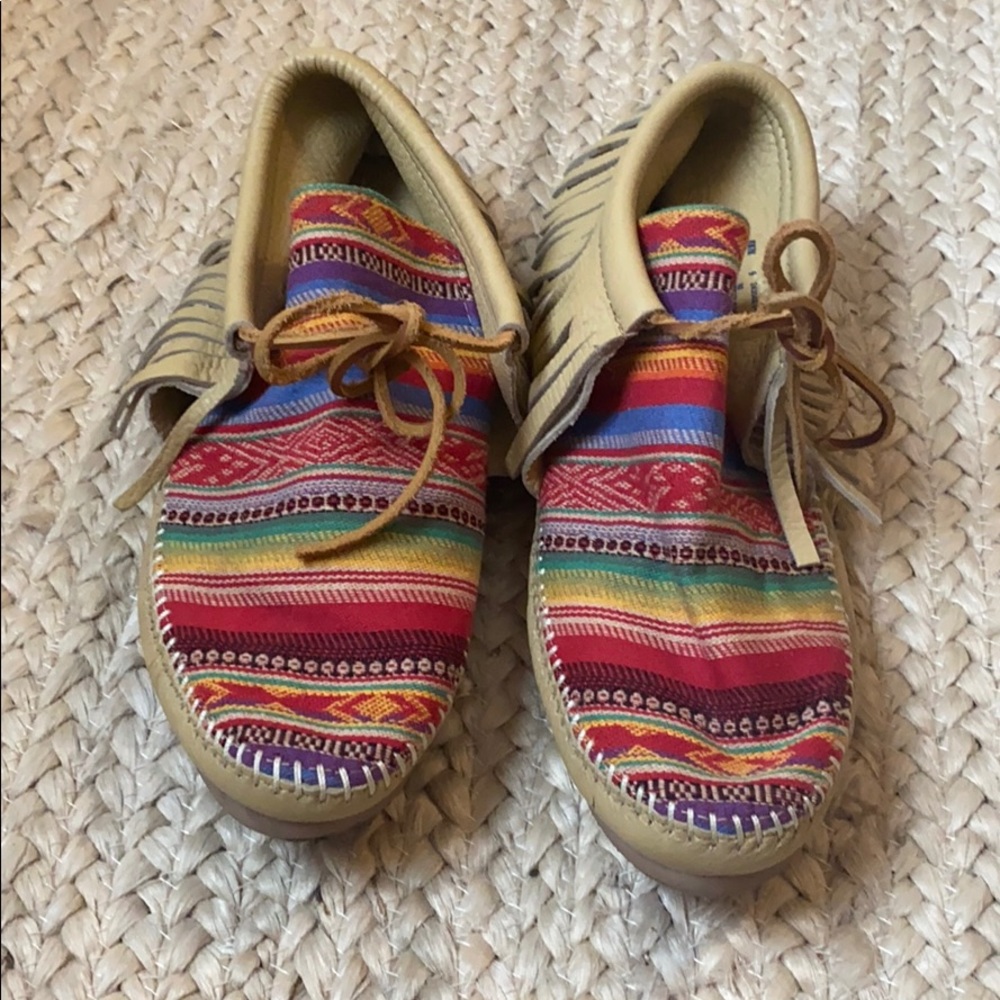Minnetonka Moccasin bootie with fringe and fabric